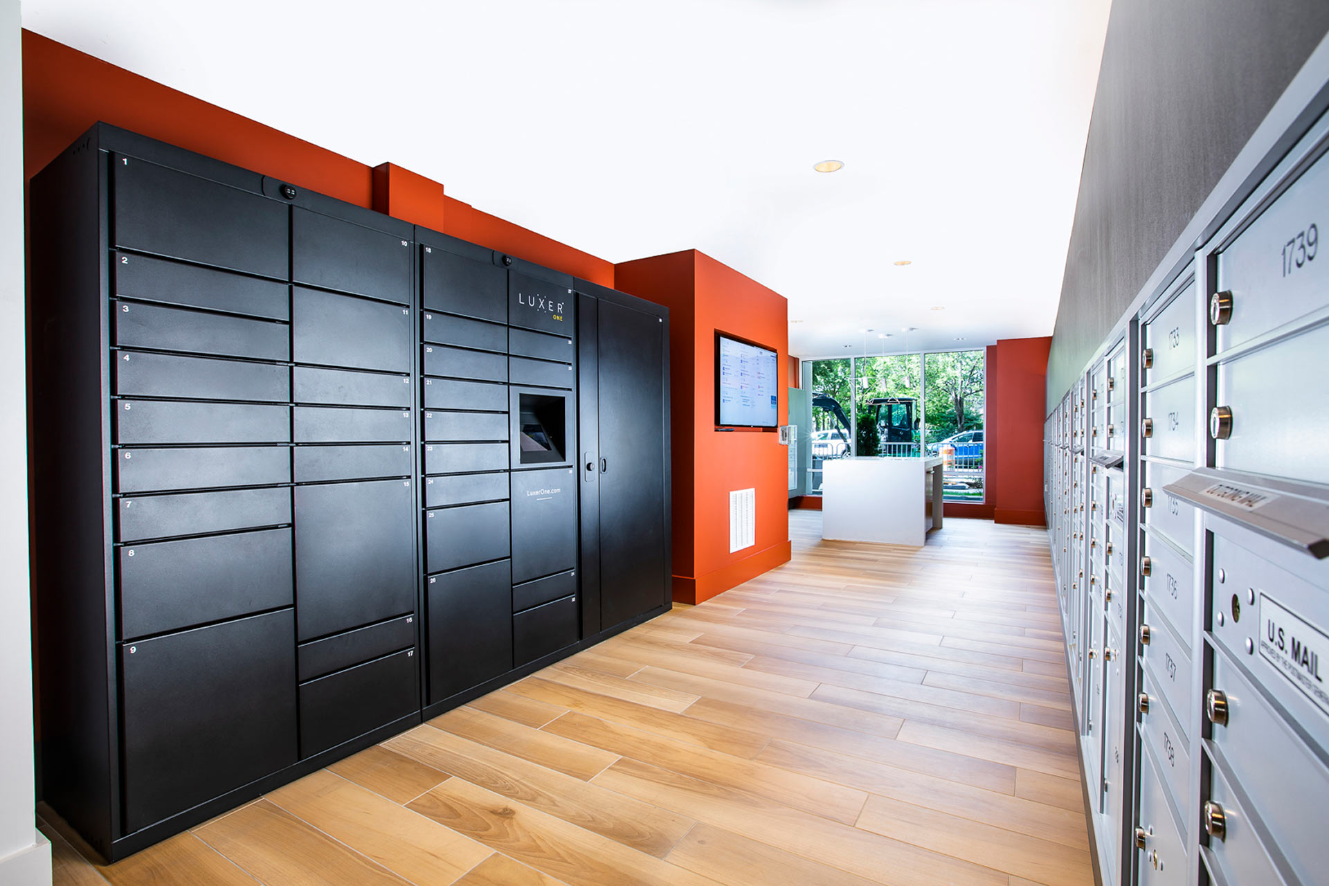 Our mailrooms are equipped with Luxer 27/4 self-service package lockers.